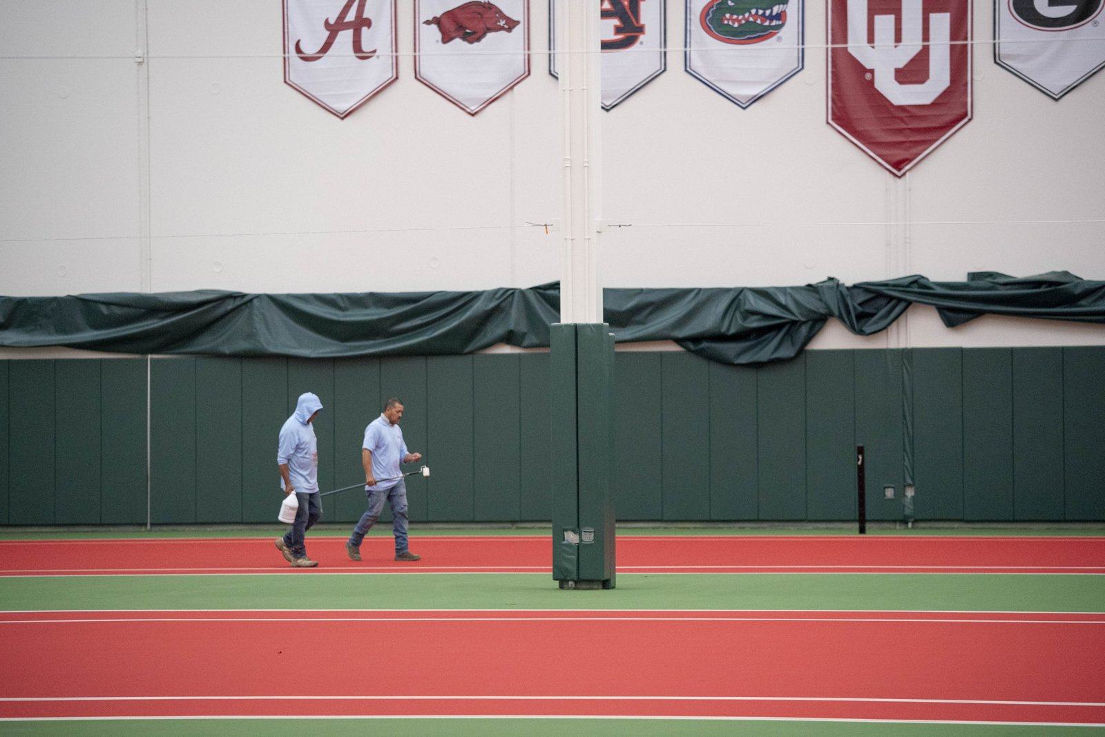 EliteTrax crew on the indoor courts at the University of Oklahoma during the 2026 resurfacing program