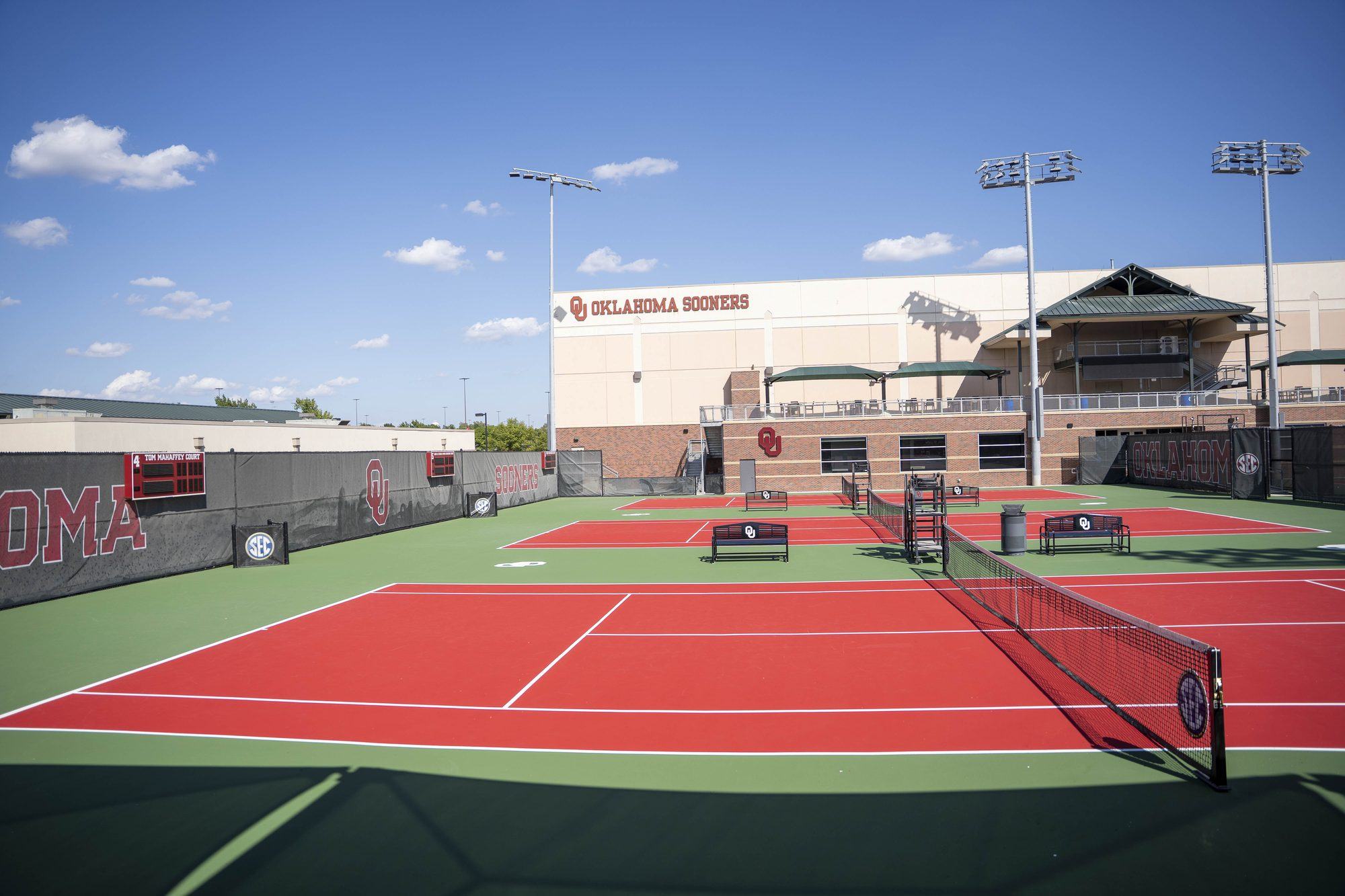 Outdoor courts at OU Headington with the Sooners building behind