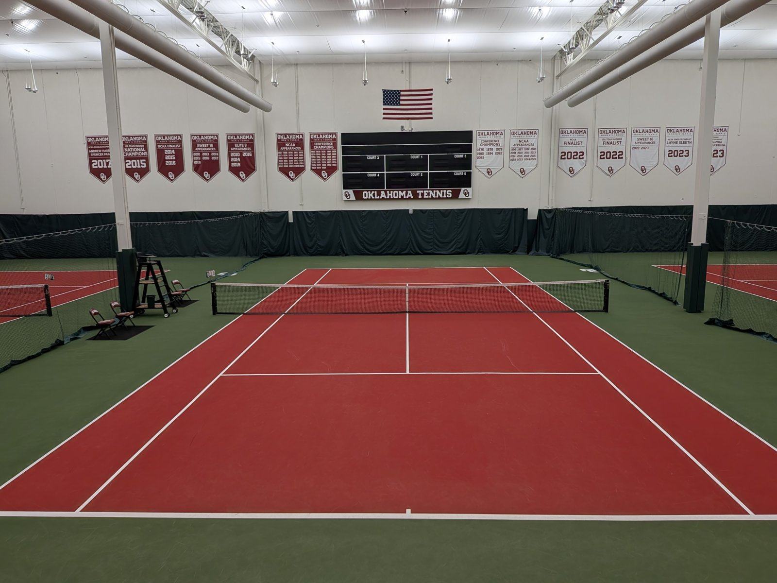 Finished indoor court at OU centered on the net with new lines and nets in place