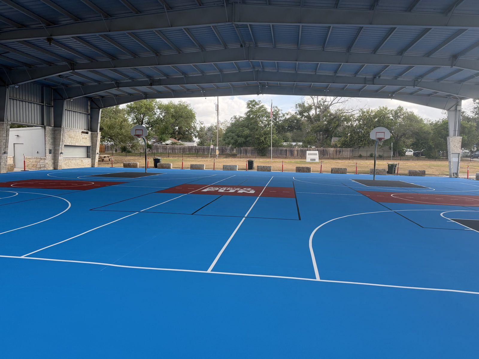 Basketball court at Pickrell Park with dark grey key