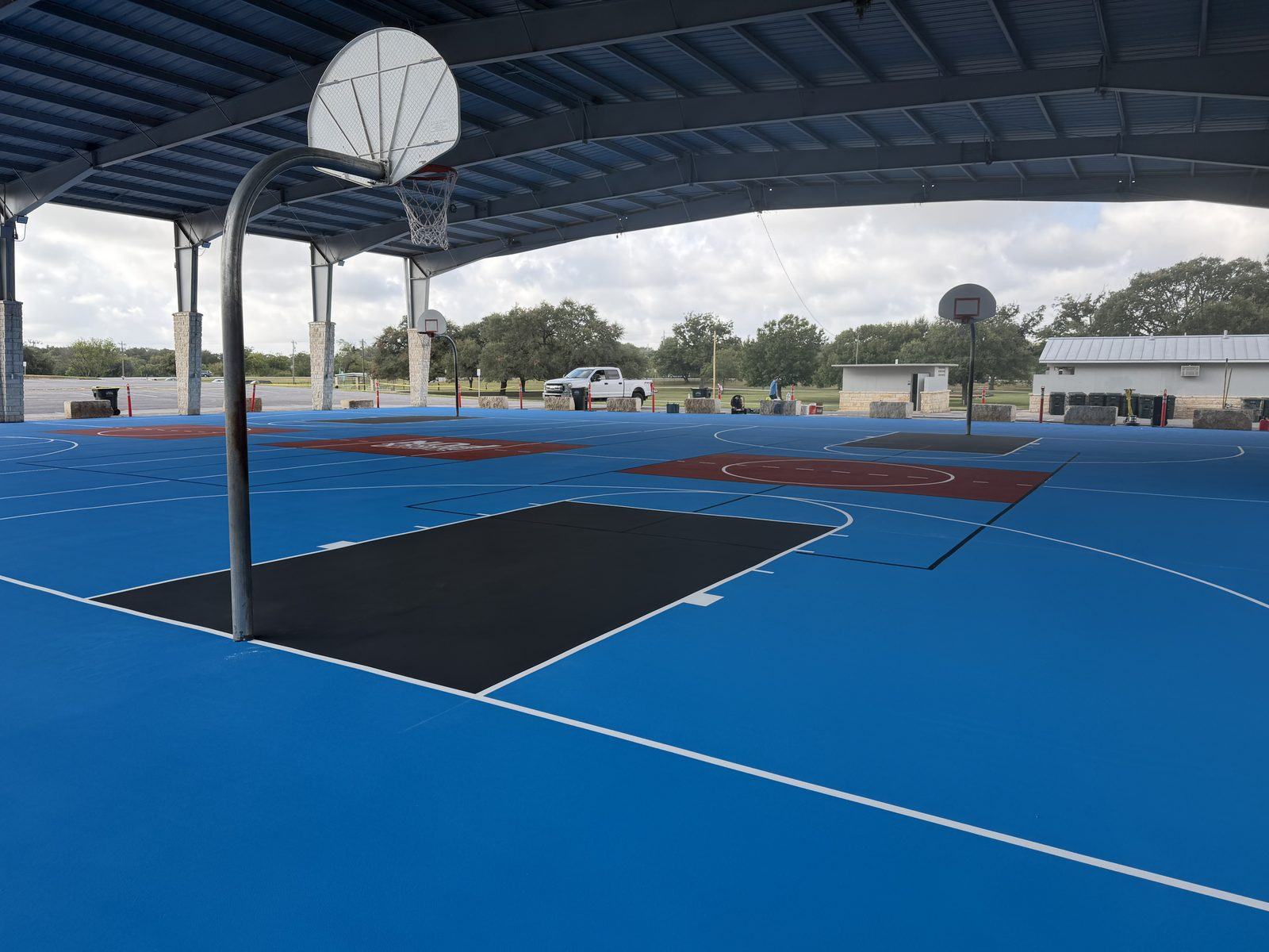 Pickleball and basketball courts under the pavilion at Pickrell Park in Schertz, Texas